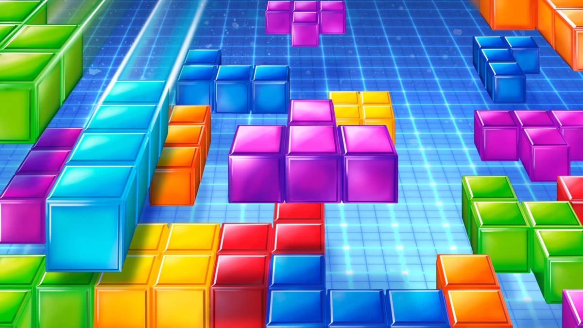 Blocks falling in artwork for a Ubisoft Tetris game, representing the signed copy of the NES version being auctioned off for charity